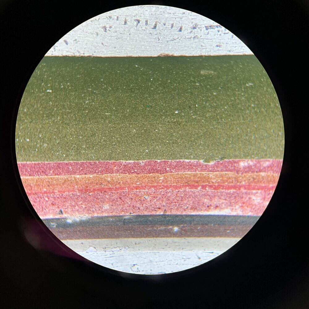 Microscopic cross-section of paint layers